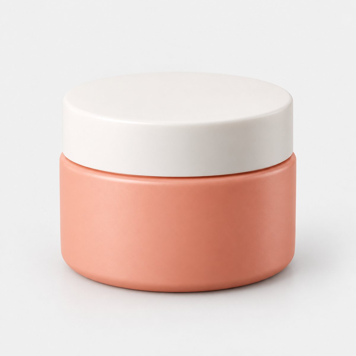 The original photo of the soft coral cream jar with its plain white lid